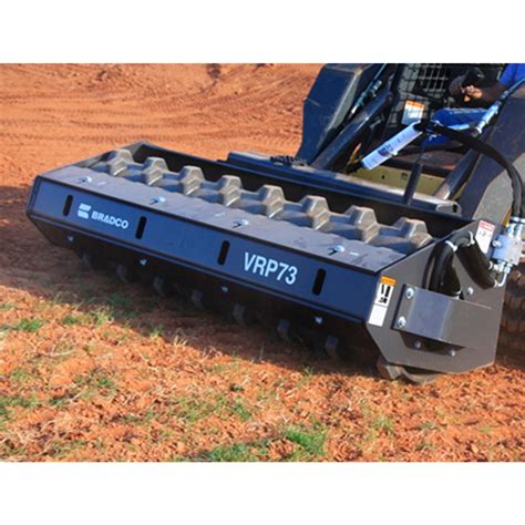 bradco gravel spreader for skid steer|skid steer padded roller attachment.